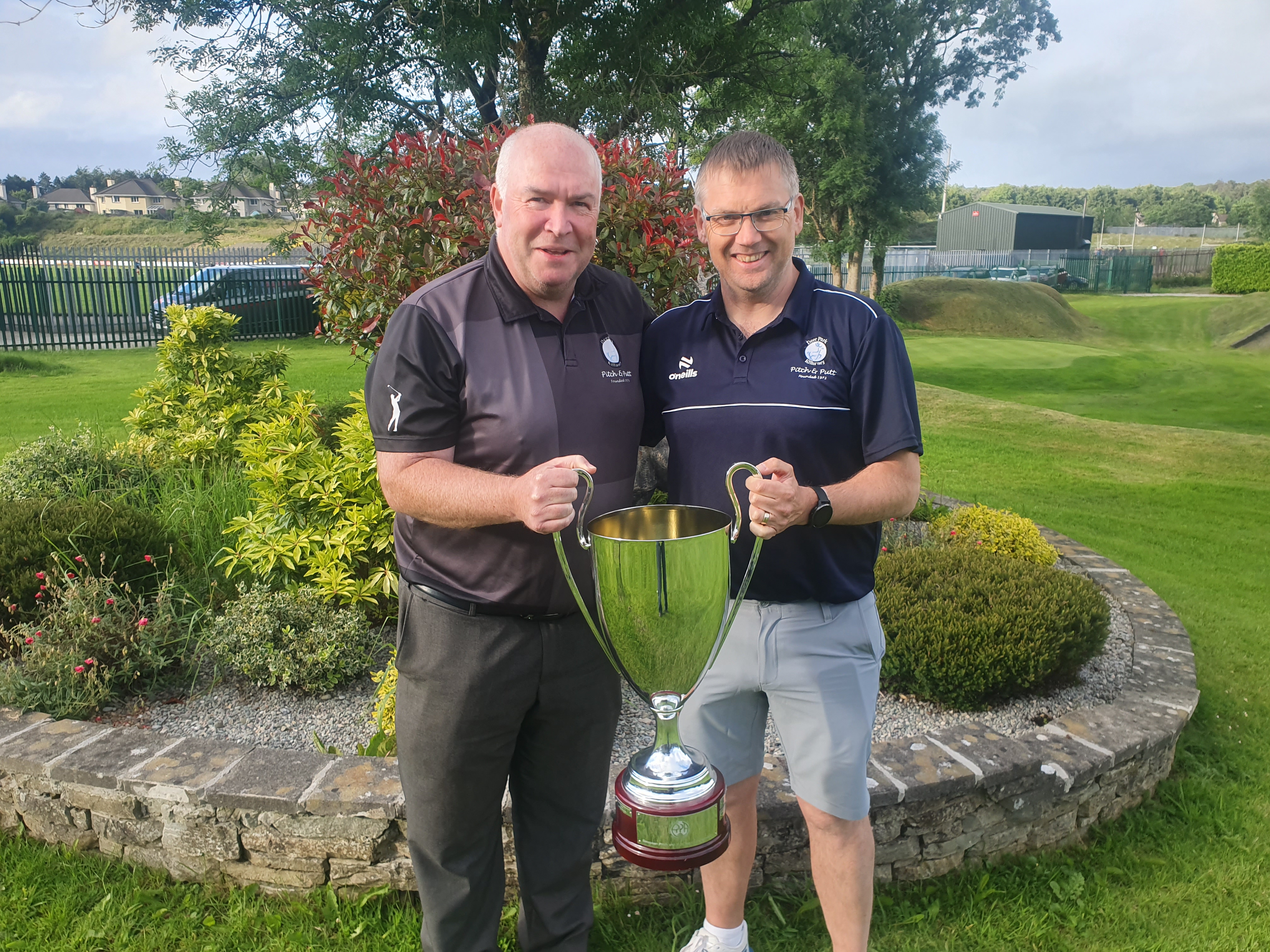 Deerpark Pitch & Putt Club President Derry McCarthy and Club Secretary Damien Fleming pictured with the European Team Championship Trophy which Damien brought to the club on Monday night as a member of last year's winning Irish side. Derry was Irish team captain for the same event in 2005 which Ireland won in Holland that year.