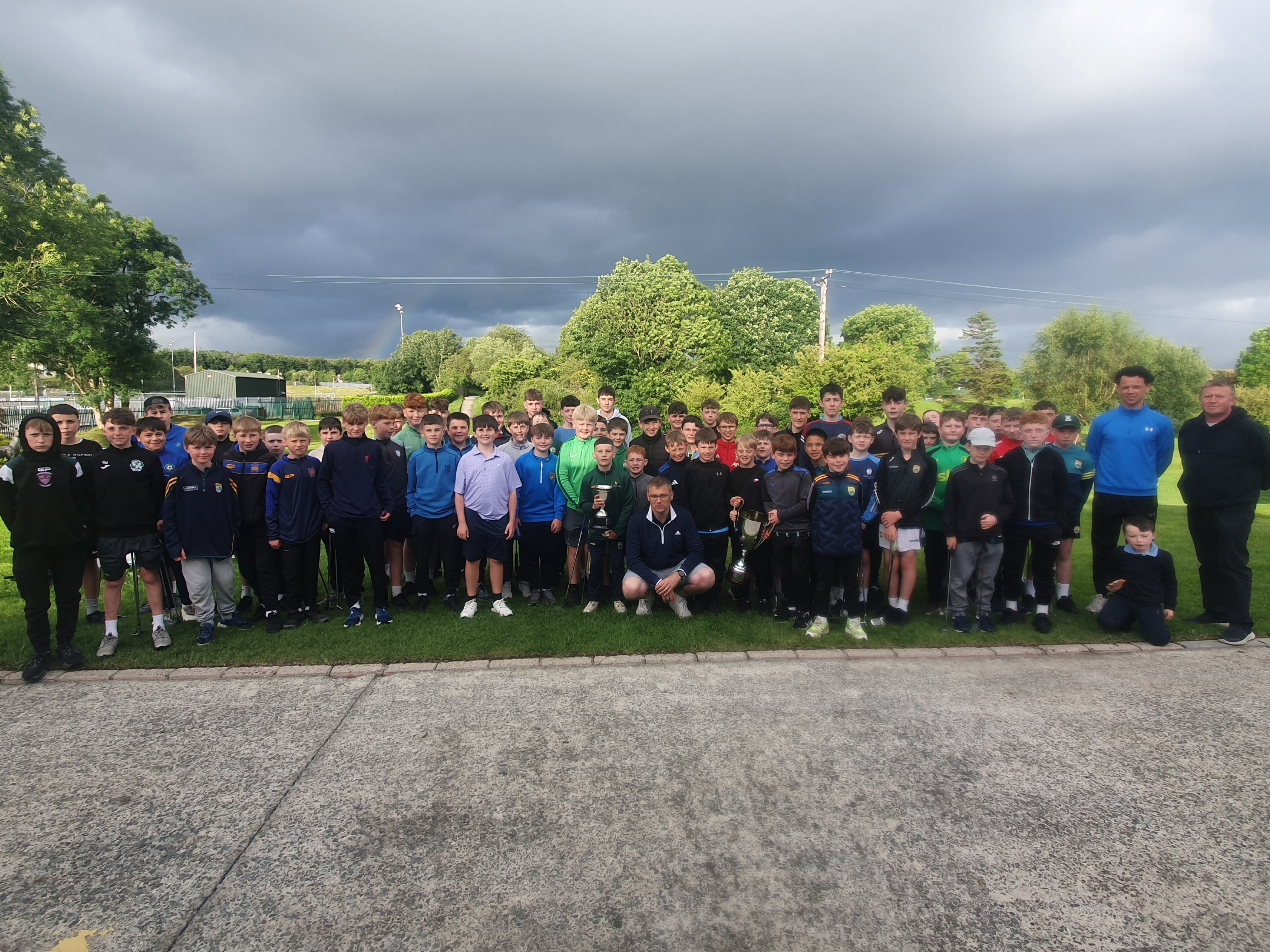 Deerpark Pitch & Putt Club Secretary Damien Fleming (kneeling, centre) pictured with some of the club's U16 members on Monday evening after a Scramble held to honour his bringing of the European and World Cup trophies for the winning Irish teams he was a part of in 2024 and 2025 to the club. Also included in photo on extreme right are the club's U16 Officers Michael Cronin and Niall O'Loughlin.