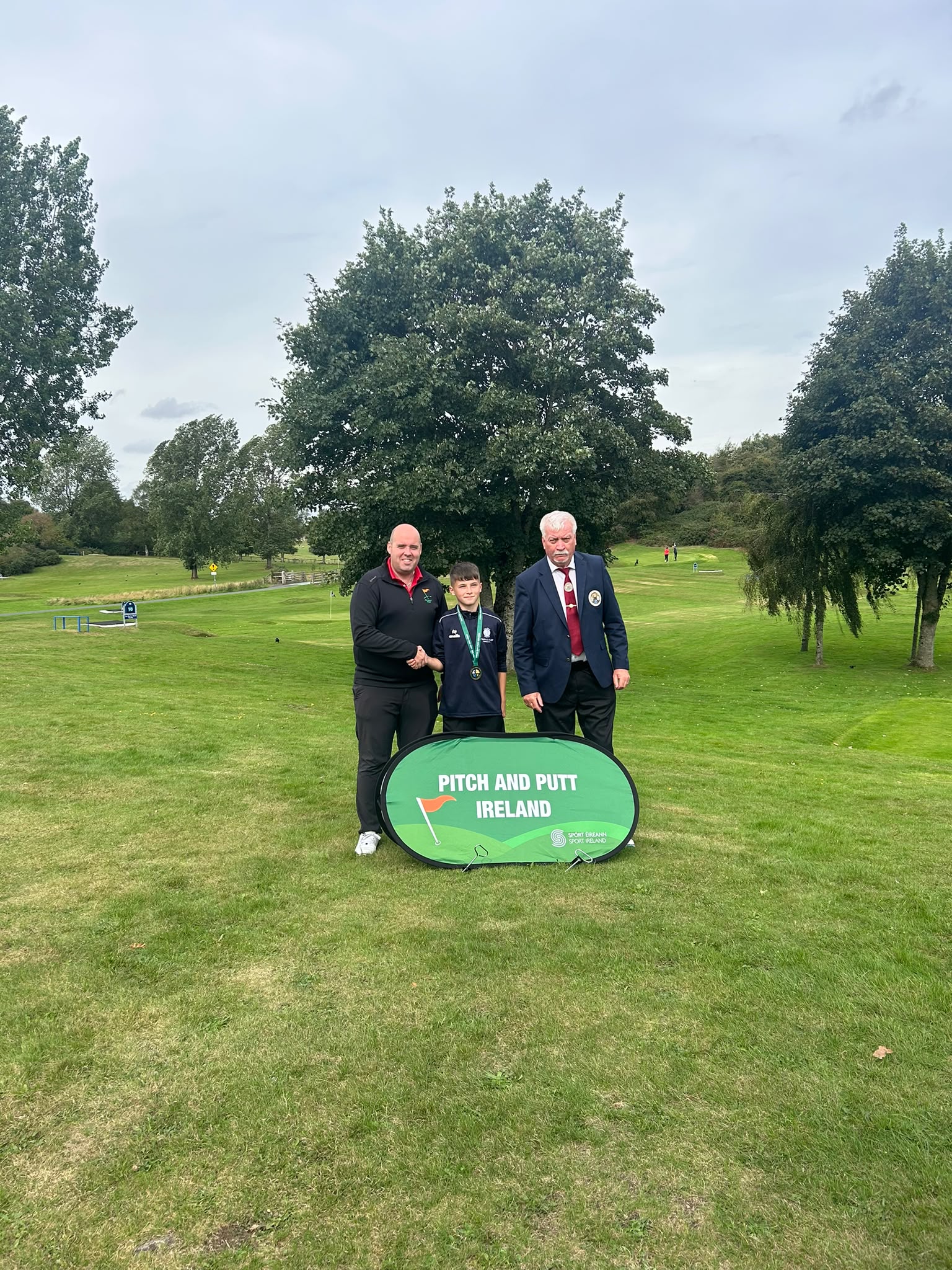 Deerpark Pitch & Putt Club's Lucas Uchtyil pictured with Pitch & Putt Ireland U16 Officer John Cahill as well as President Davy Reddin after receiving his prize for reaching the National U16 Matchplay Boys Plate semi-finals in Athgarvan, Co Kildare last weekend.